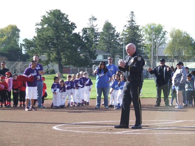 Captain (now Chief) Sellers preapres to throw first pitch of 2011 PAL-GAL Softball Season